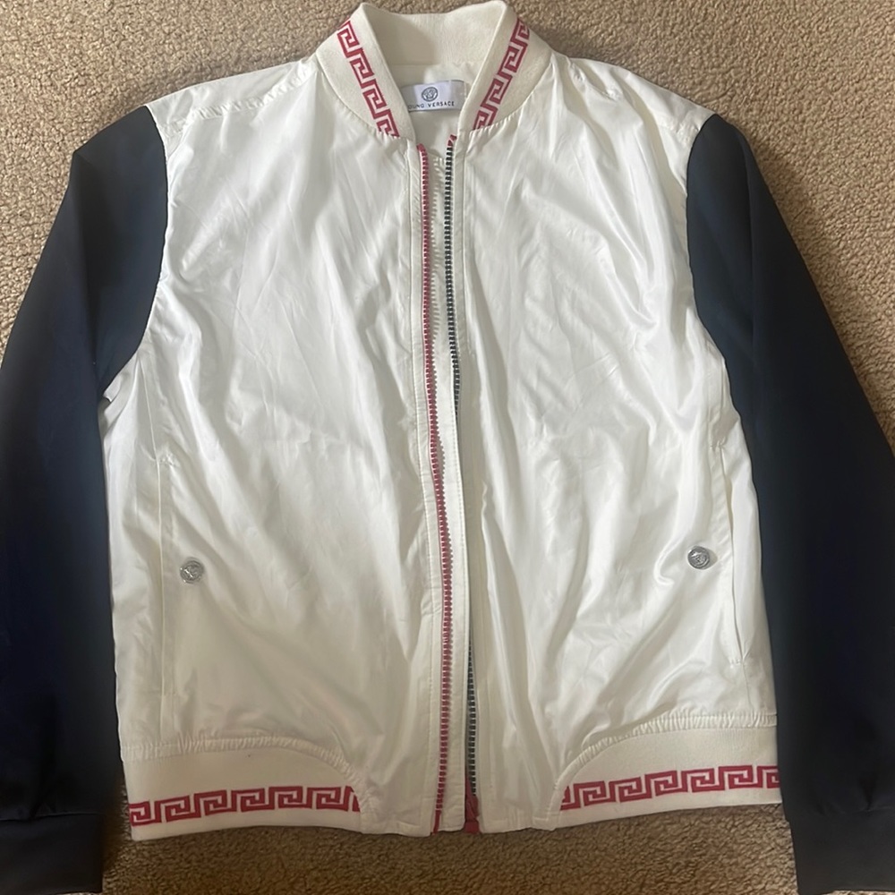 Young Versace. Back has Versace symbol that doesn’t show well in the photo